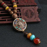 2019 New Round Plate Nepal Flower Pendant Ethnic Necklace Egypt Elephant Necklace Coconut Beads Necklace Sweater Necklaces