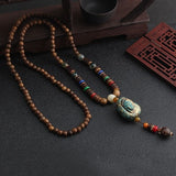 2019 New Round Plate Nepal Flower Pendant Ethnic Necklace Egypt Elephant Necklace Coconut Beads Necklace Sweater Necklaces