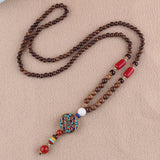 2019 New Round Plate Nepal Flower Pendant Ethnic Necklace Egypt Elephant Necklace Coconut Beads Necklace Sweater Necklaces