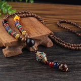 2019 New Round Plate Nepal Flower Pendant Ethnic Necklace Egypt Elephant Necklace Coconut Beads Necklace Sweater Necklaces